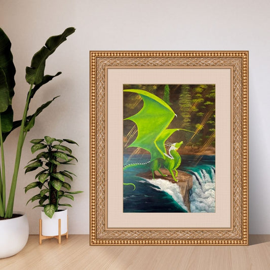Framed acrylic painting featuring a green forest dragon preparing to leap into the sky from the edge of a rushing waterfall.